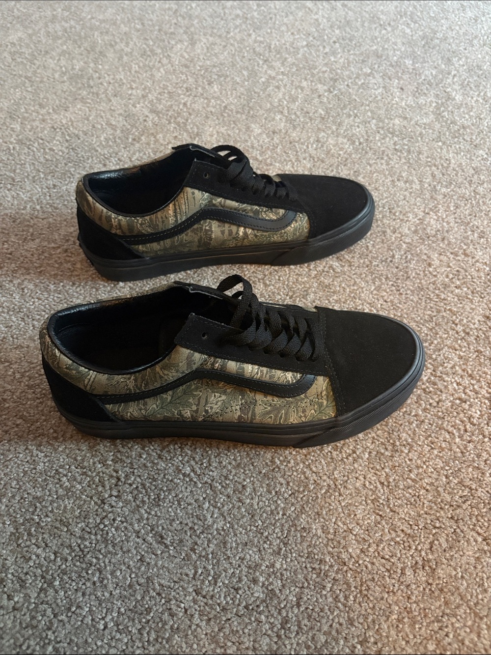 Black and camouflage Vans Women’s 8.5, Men 7